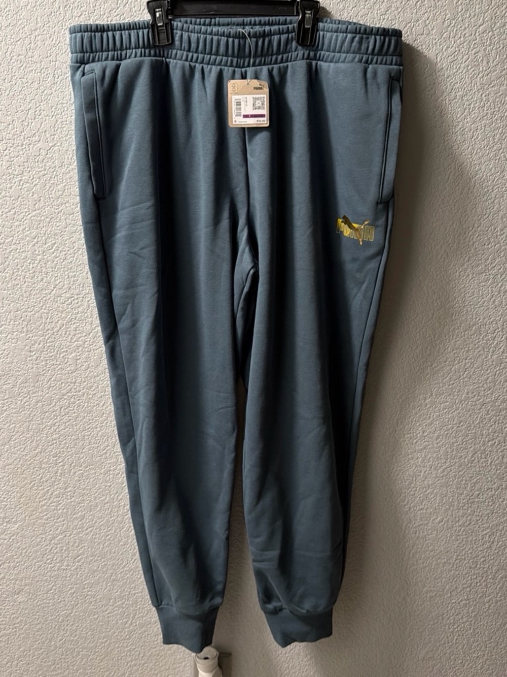 Puma Men's Slate Blue Joggers with Gold Logo